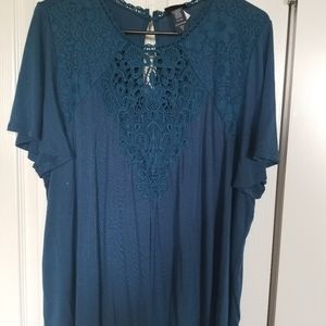 Torrid tee with lace insert.